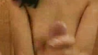 Girl massages cock and makes it cum
